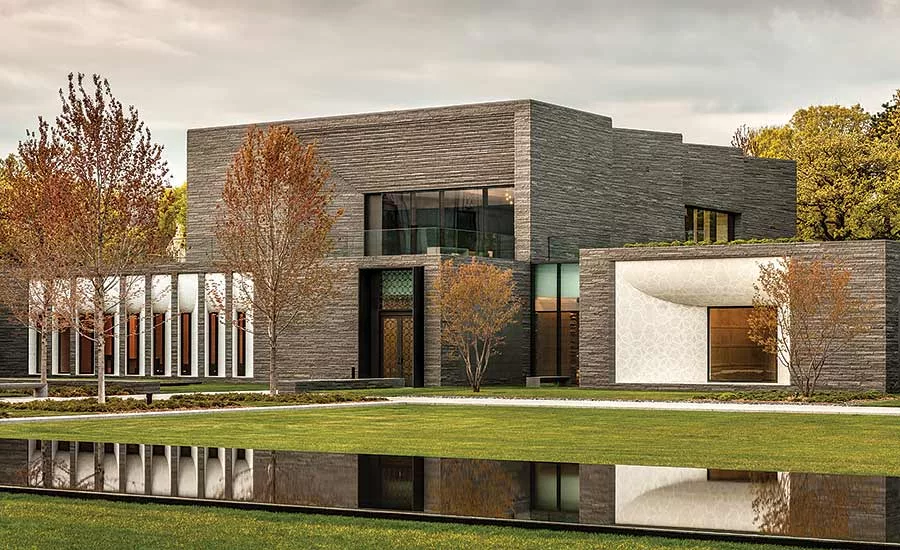 SW July 2021 Stone of the Month: Charcoal Black Granite on a house. © Amesse Photography