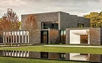 SW July 2021 Stone of the Month: Charcoal Black Granite on a house. © Amesse Photography