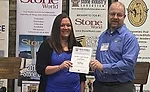 SW 1021 Inside the Shop: Colorado Stone Summit, Dany Anderson, MSI Denver, accepts certificate for hosting.