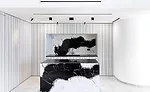 Antolini Treviso: Dalmata marble creates a dramatic effect in the kitchen of an upscale apartment in Treviso, Italy.