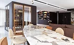 Antolini Treviso: In the main living area, Patagonia “Original,” an exclusive natural quartz by Antolini, was selected for the dining room tabletop.
