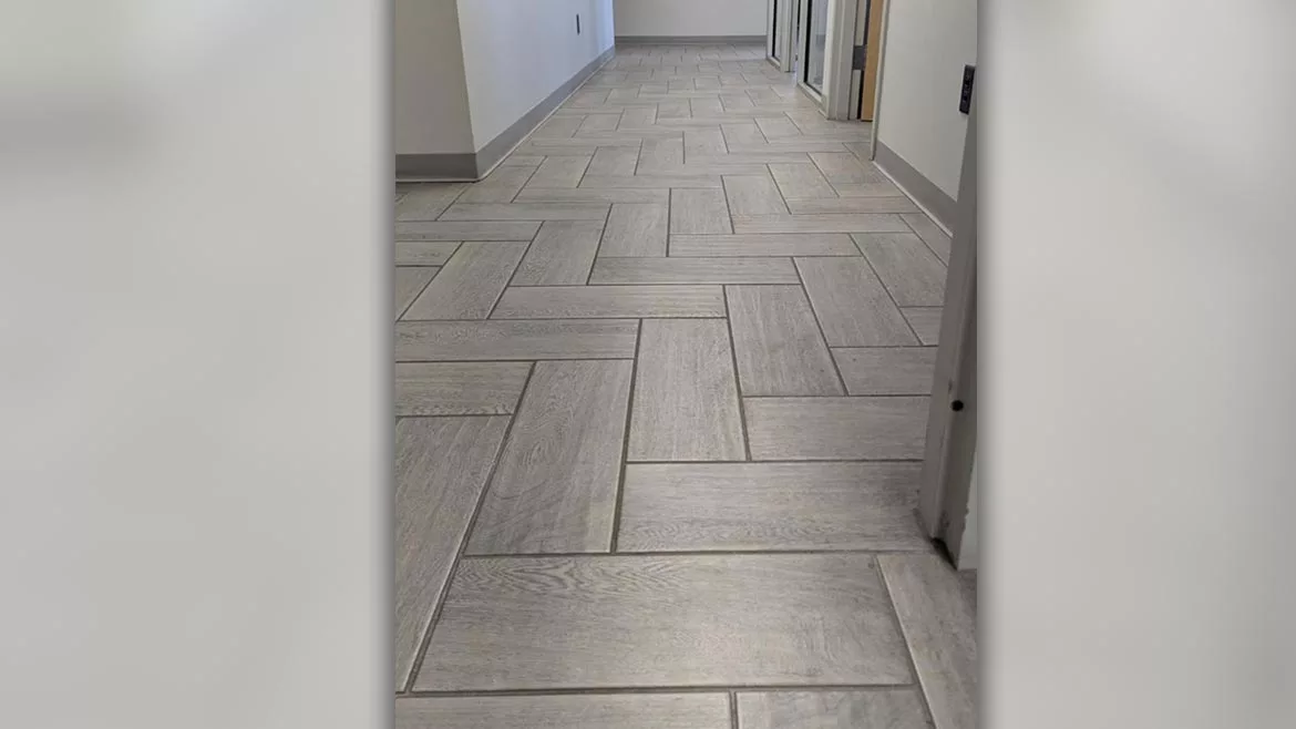 ceramic tile installed in a herringbone pattern