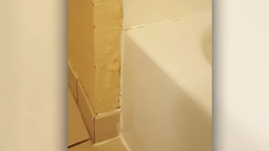 Water damage to the drywall tub apron