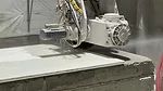 a concrete saw or a stone-cutting saw