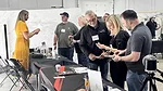fabricators visiting with Stone Industry Education event sponsors