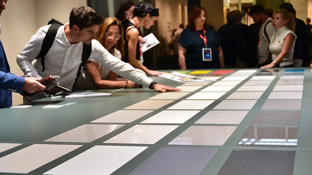 02 SW 1223 2023 Cersaie Wrap-Up Podcast. Tile laid out on a table.